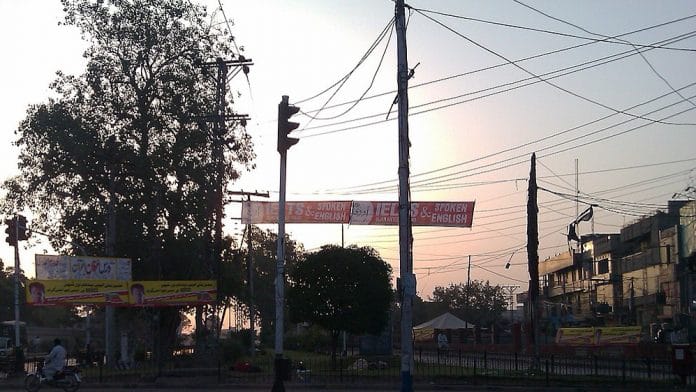 Electric wires hanging from poles in Lahore