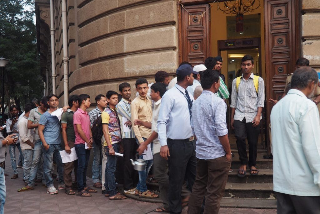 A queue of people stand outside a bank to exchange old notes in 2016 after the government announced the demonetisation scheme. 