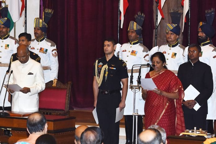 Nirmala Sitharaman being sworn in as defence minister by President Ram Nath Kovind