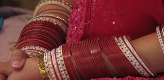 A woman's hand with bangles