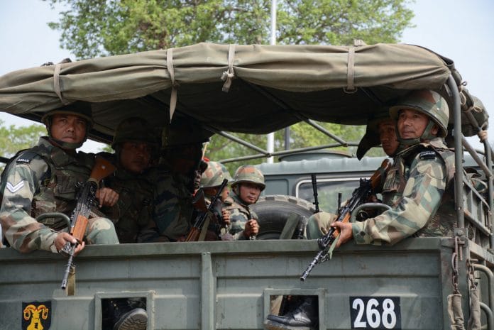 Indian Army soldiers in a truck.