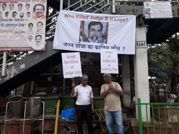 Two persons demanding a probe into judge B.H. Loya's demise