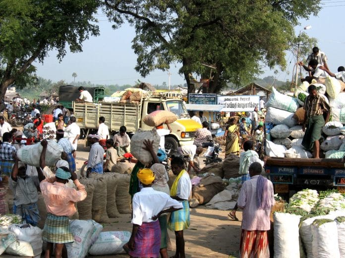 Farmers loading their produce