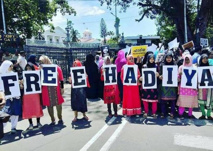 Picture of people protesting to free Hadiya