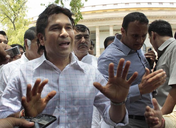 Sachin Tendulkar speaks to the media outside Parliament