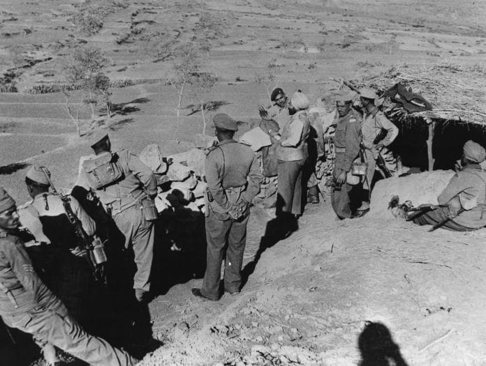 Indian soldiers in a makeshift fort facing Chinese troops