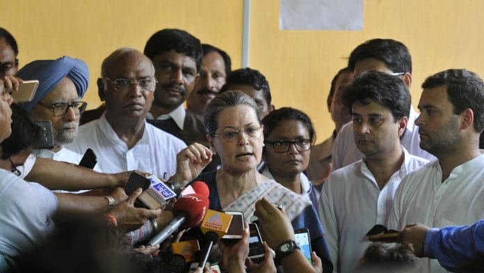 Congress President Sonia Gandhi, former Prime Minister Manmohan Singh, and Congress Vice President Rahul Gandhi addressing the media.