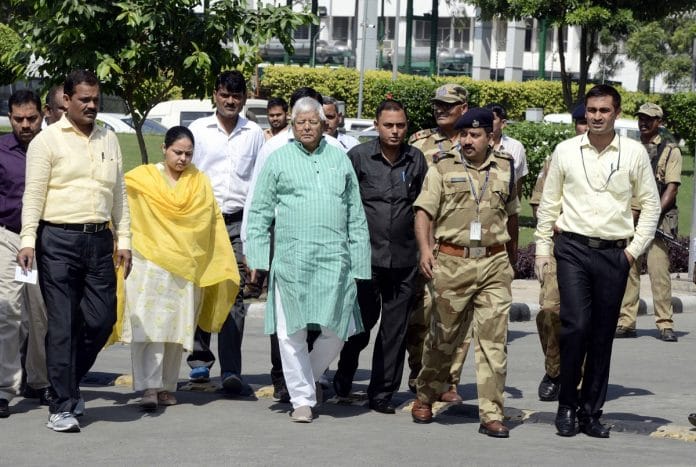 RJD Chief Lalu Yadav and his daughter Misa Bharti at CBI headquarter on October 5, 2017 in New Delhi, India.