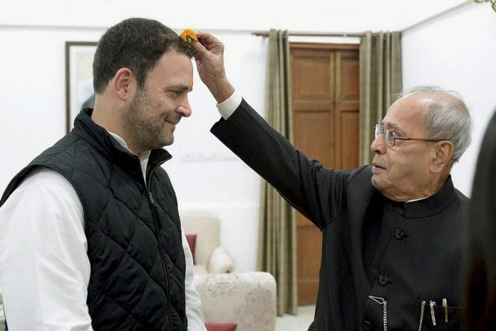 Congress president Rahul Gandhi being greeted by former President Pranab Mukherjee | PTI