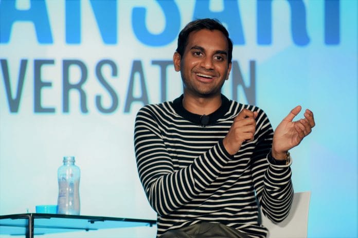 Aziz Ansari speaks onstage