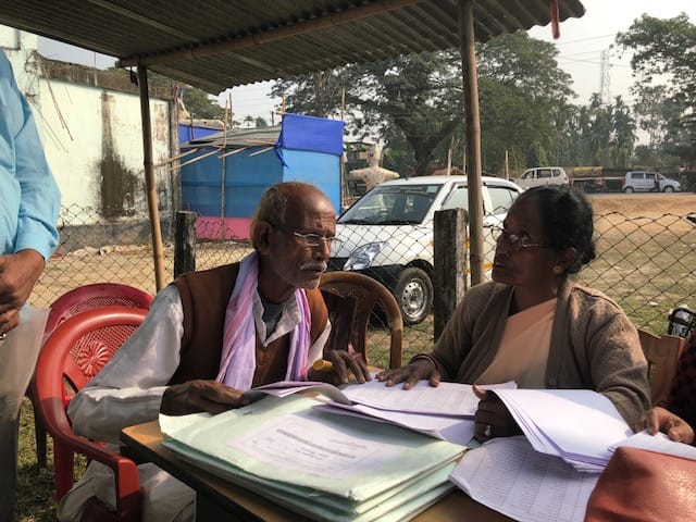 An applicant checking his name in a list