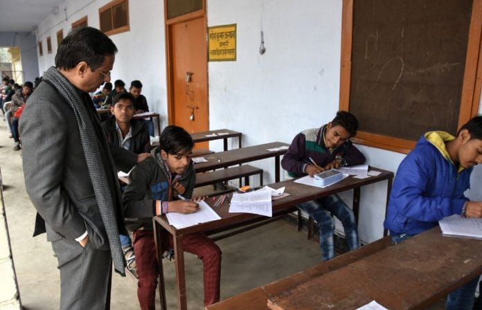 Deputy Chief Minister Dinesh Sharma at an examination centre during examinations