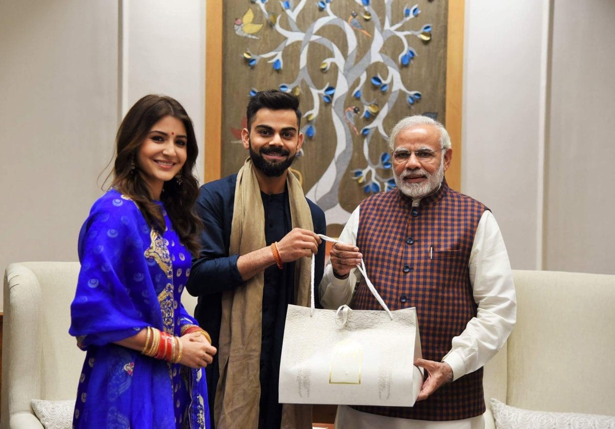 Virat Kohli and Anushka Sharma inviting Prime Minister Narendra Modi for their reception in Delhi