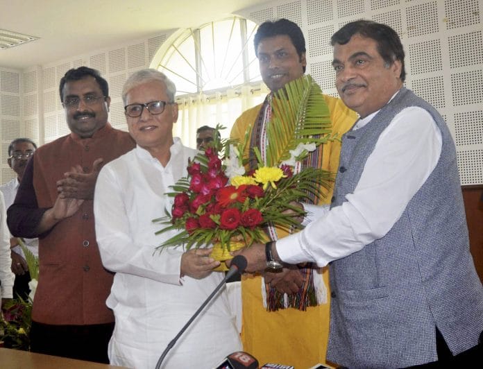 Union minister Nitin Gadkari, Tripura's Deputy CM Jishnu Devvarman, and Tripura BJP President and Chief Minister-designate Biplab Deb