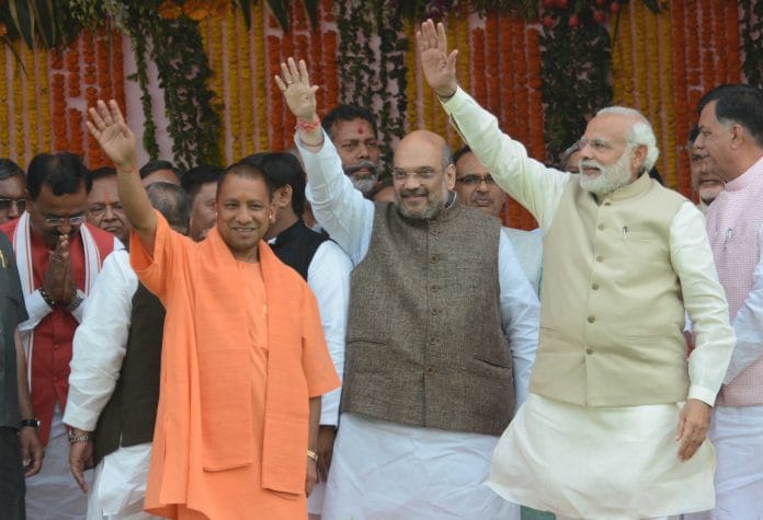 Amit Shah, Yogi Adityanath and Narendra Modi in Lucknow | Ashok Dutta/Hindustan Times via Getty Images