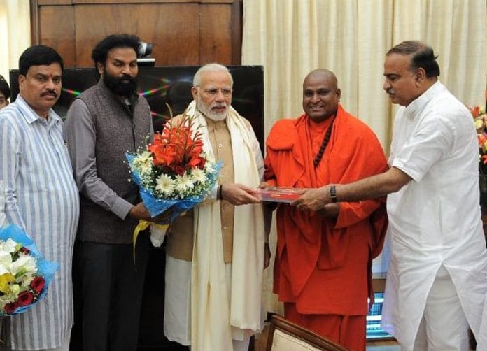 B. Sriramulu second from the left)