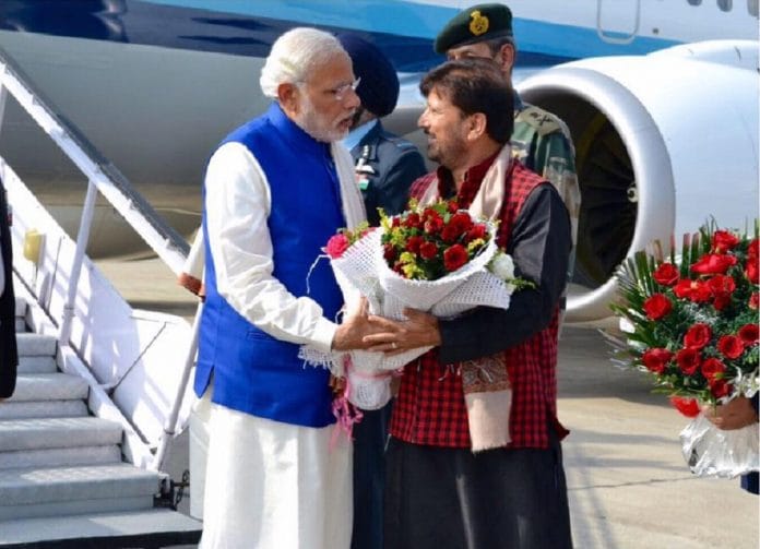 Lal Singh with Narendra Modi