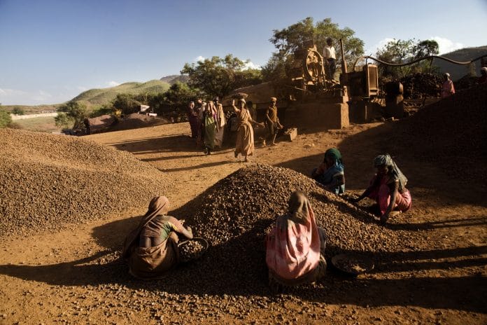 Women working in the iron ore mining area in Hospet, Karnataka