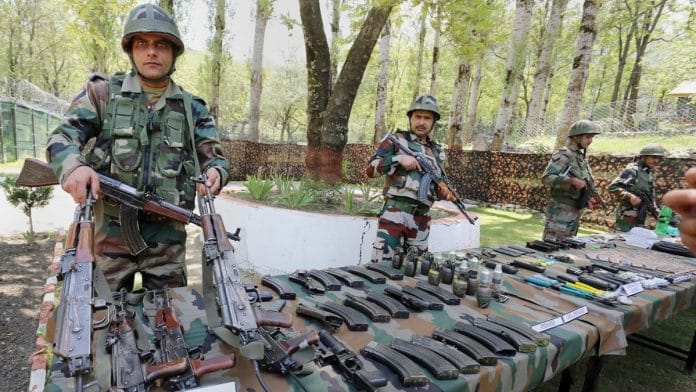 Army personnel display a huge cache of arms and ammunition (representational image) | PTI