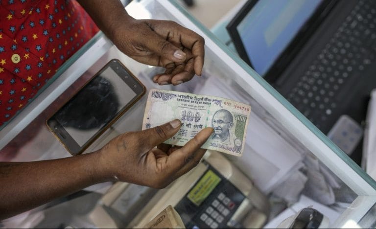 RBI says rate hike not meant to boost rupee, analysts say it will