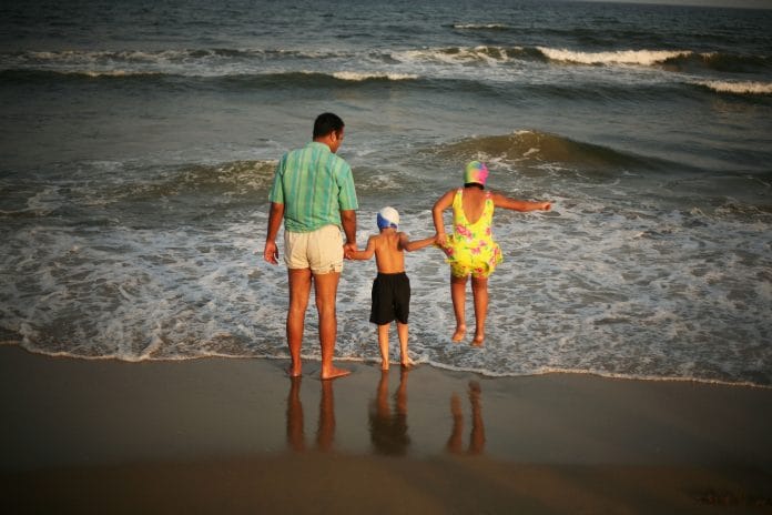 Two children and their father in Chennai (representational image) | Mark Kolbe/Getty Images