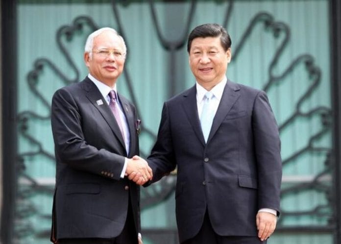 Chinese President Xi Jinping with Malaysian PM Najib Razak