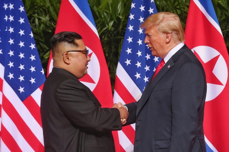 ‘We will have a terrific relationship ahead’: Trump and Kim Jong-un shake hands