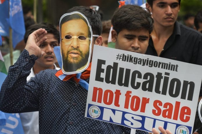 NSUI activists raise slogans against Institute of Eminence tag to Jio Institute | PTI