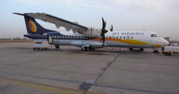 A Jet Airways aircraft at an airport. Under the UDAN scheme, the government has reached out to private airlines to operate between smaller cities | Commons