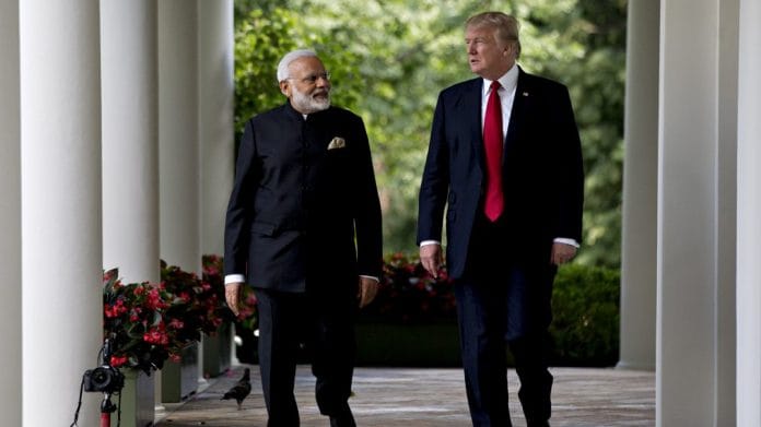 Narendra Modi and Donald Trump | Andrew Harrer/Bloomberg