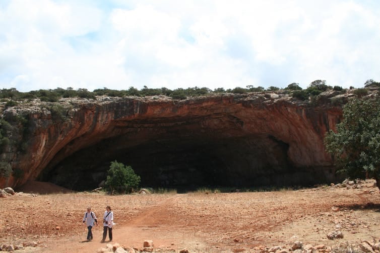 The entrance to the Haua Fteah cave site, Libya. Giulio Lucarini, University of Cambridge