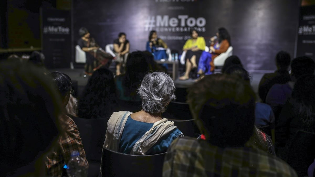 People listen to a discussion with Sandhya and Mahima at a #MeToo event in Mumbai | Dhiraj Singh/Bloomberg