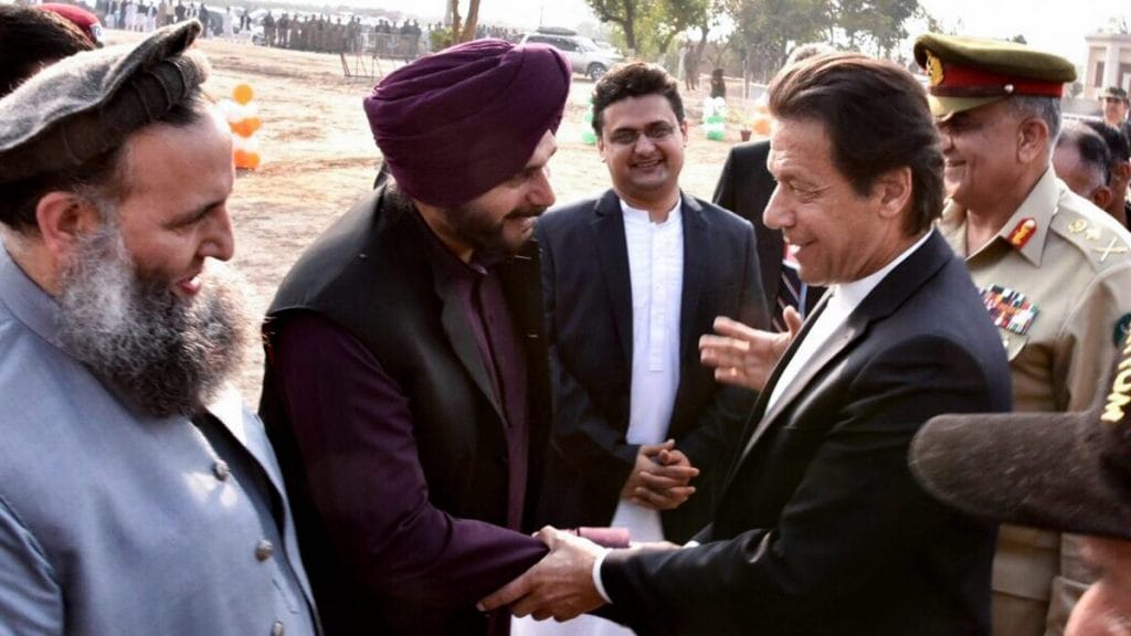 Pakistan PM Imran Khan shakes hands with Navjot Singh Sidhu during Kartarpur ceremony | PTI