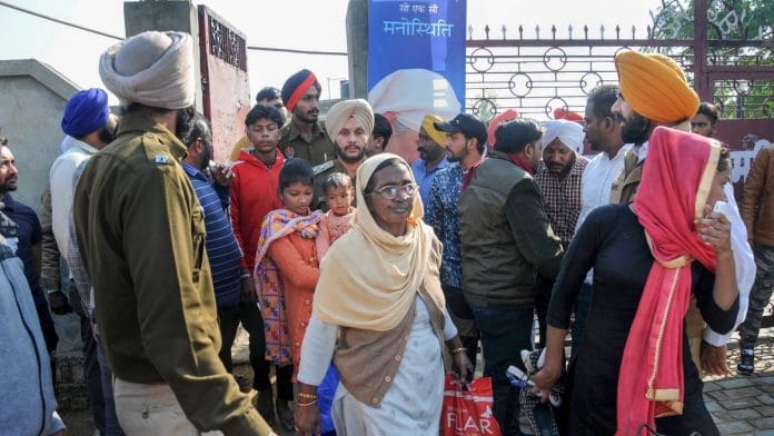 People come out of the Nirankari Bhawan in Adliwal village near Amritsar | PTI