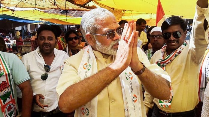 In this undated photo, a Prime Minister Narendra Modi look alike campaigns for Congress Party in Dantewada district of Chhattisgarh.