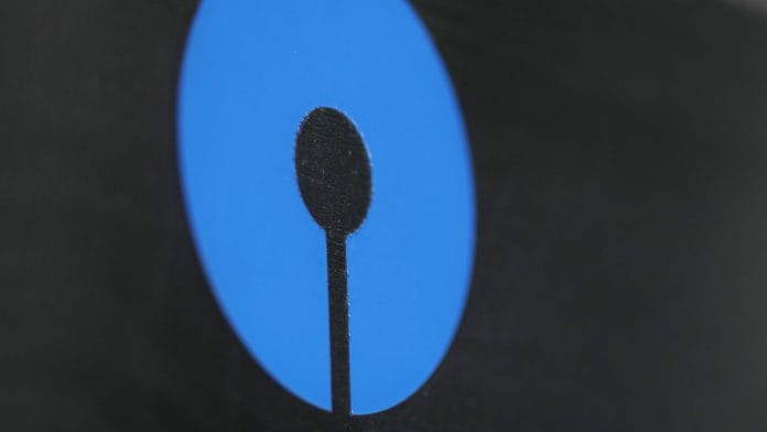State Bank of India Ltd. logo een at a branch in Mumbai | Dhiraj Singh/Bloomberg