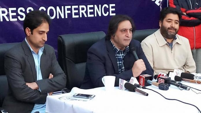 File photo of People's Conference leader Sajad Lone (C) | jkpc.in/Facebook