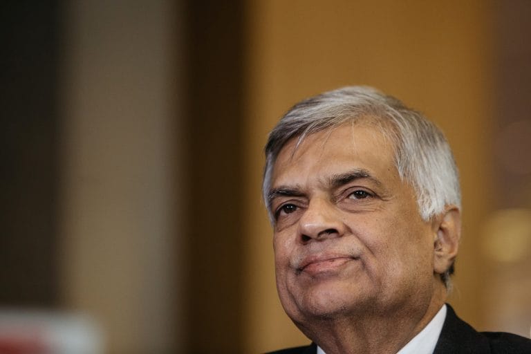 President Sirisena reinstates Wickremesinghe as prime minister to end Sri Lanka crisis