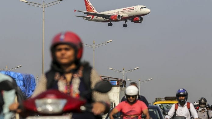 An Air India aircraft lands at Chhatrapati Shivaji International Airport in Mumbai | Dhiraj Singh/Bloomberg