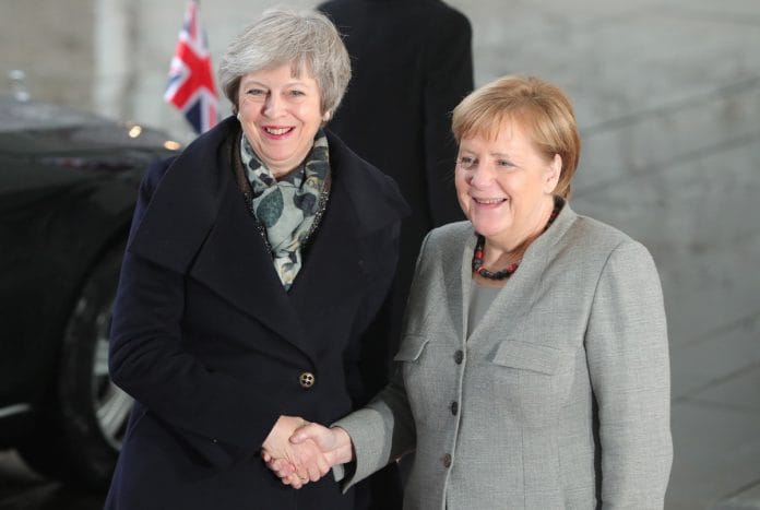 Theresa May and Angela Merkel