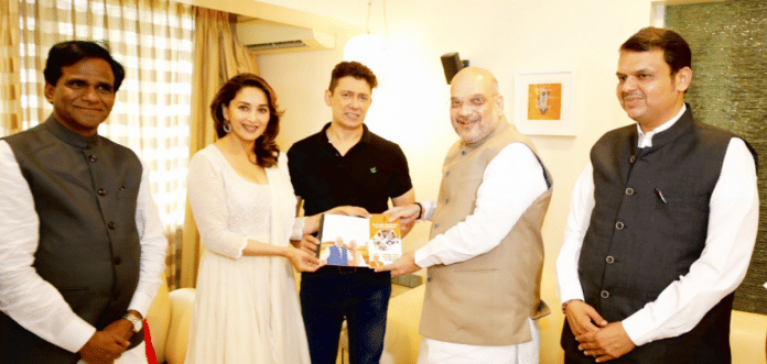 Amit Shah with actress Madhuri Dixit
