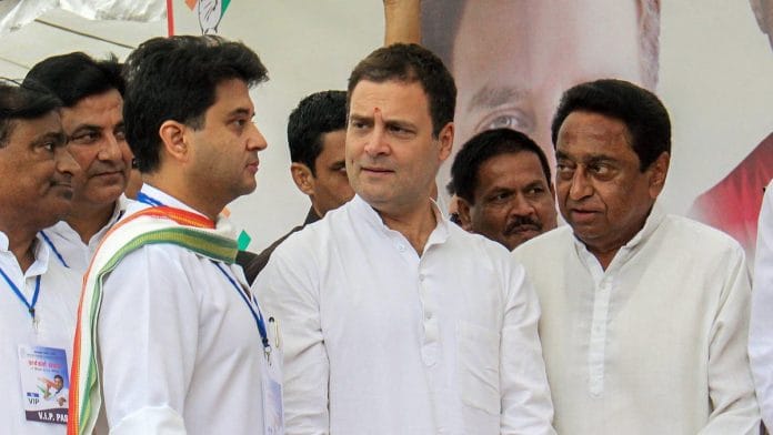 File image of Rahul Gandhi (C), Jyotiraditya Madhavrao Scindia (L) and Kamal Nath during a roadshow in Bhopal
