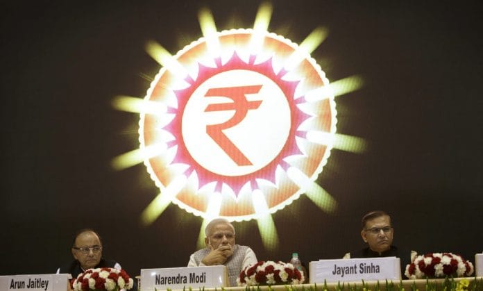 Arun Jaitley, Narendra Modi, and Jayant Sinha at the launch of the Micro Units Development and Refinance Agency (MUDRA) Bank | Kuni Takahashi/Bloomberg