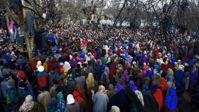 Villagers attend funeral prayers of most wanted militant commander Zeenat-ul-Islam, who was killed with his associate in an encounter with security forces at Katpora area of Kulgam District