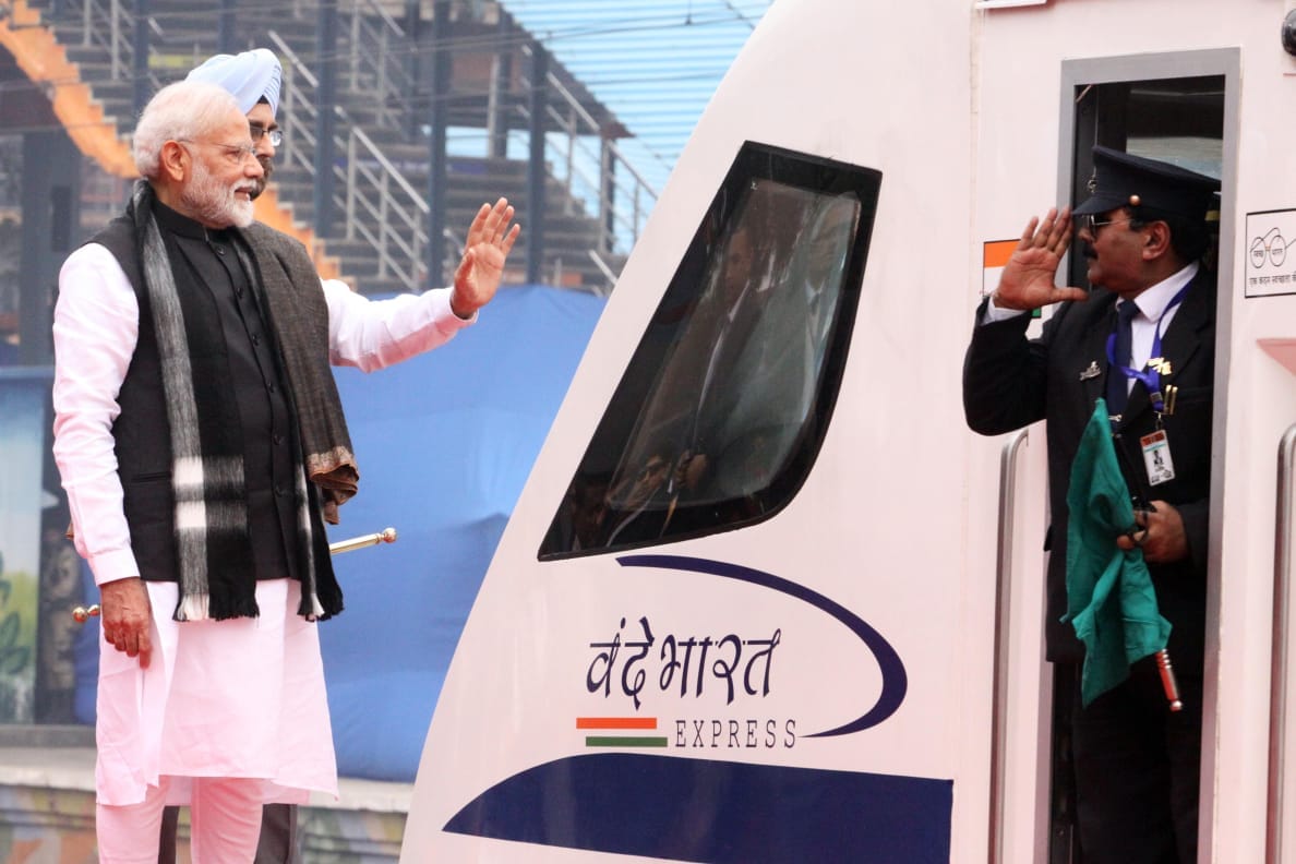 The train driver salutes PM Modi before starting Train 18's first journey