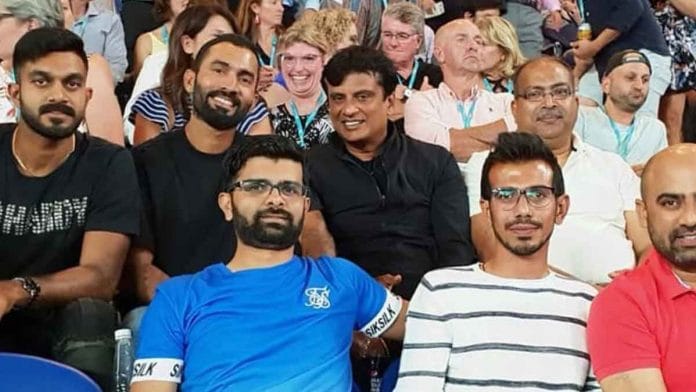 National Cricket Academy COO Tufan Ghosh (top right) watches the Australian Open with members of the Indian team (Photo: Baidurjo Bhose | Hindustan Times)
