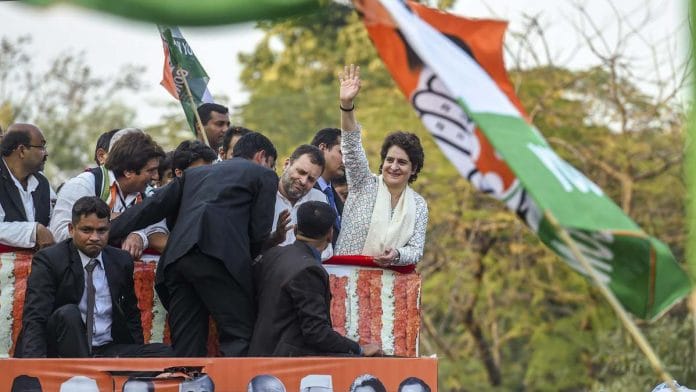 Congress President Rahul Gandhi and party General Secretary Priyanka Gandhi Vadra (R) during their roadshow in Lucknow