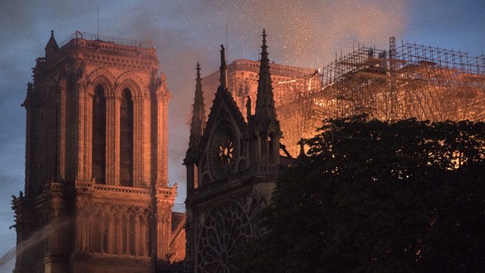 Flames and smoke rise from a fire at Notre-Dame Cathedral in Paris, France