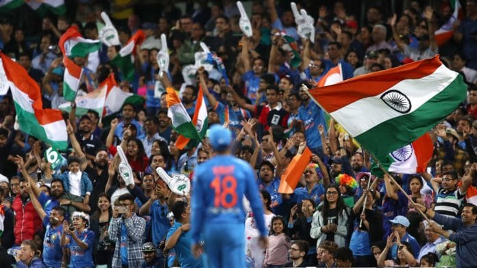 Captain Virat Kohli looks towards a sea of supporters