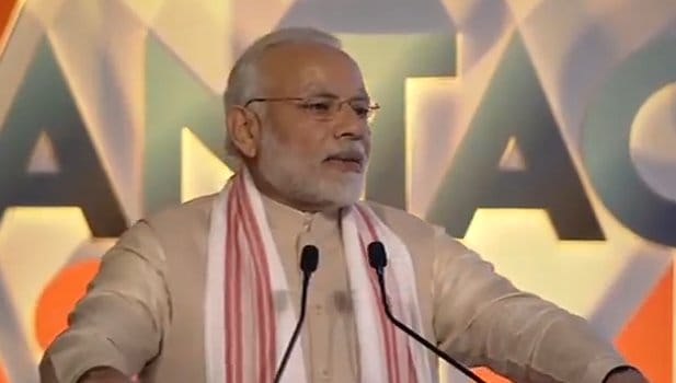 File image of PM Narendra Modi at a business summit in Assam | @BJP4India/Twitter